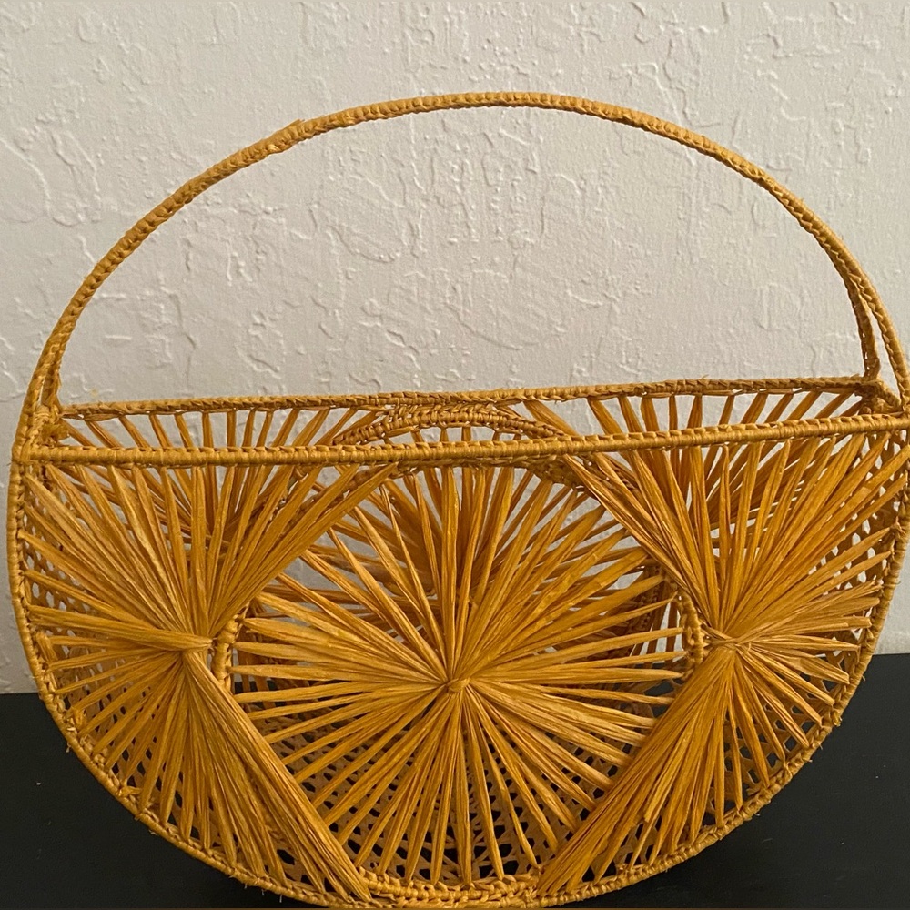 Straw like purse/clutch.